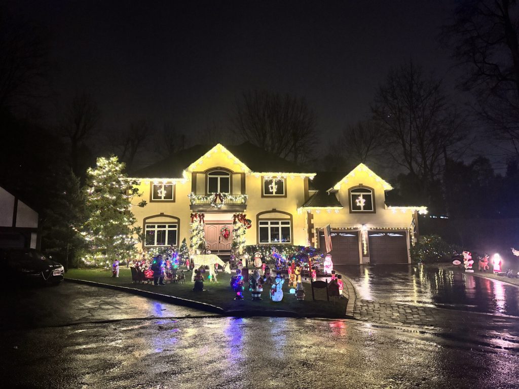 Christmas light installation on a Greenwich CT home with colorful holiday displays.