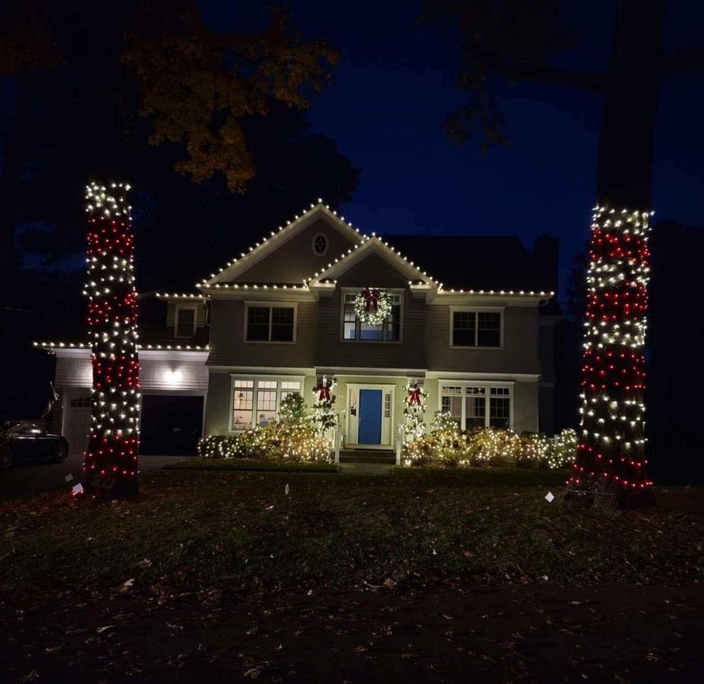 Home with red and white Christmas lights