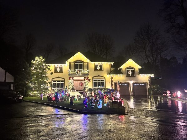 Christmas light installation on a Greenwich CT home with colorful holiday displays.